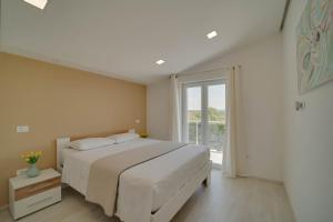 Postel nebo postele na pokoji v ubytování BLACK DIAMOND Apartment