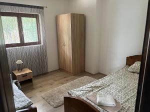 Letto o letti in una camera di Mokra Gora Central Apartments