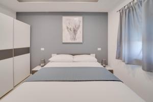 Postel nebo postele na pokoji v ubytování BLACK DIAMOND Apartment