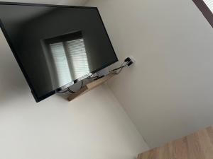 TV o dispositivi per l'intrattenimento presso Mokra Gora Central Apartments