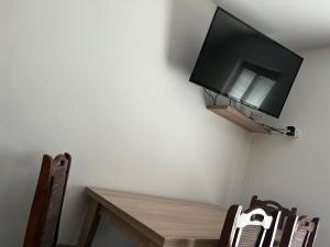 TV o dispositivi per l'intrattenimento presso Mokra Gora Central Apartments