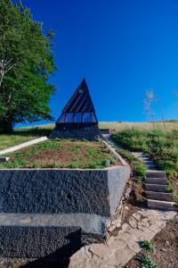 a pyramid sitting on top of a set of stairs at Stairway - Vučje in Nikšić