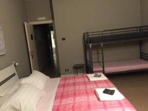 Postel nebo postele na pokoji v ubytování B&B Aurora