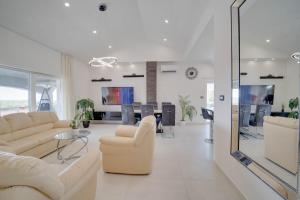 TV a/nebo společenská místnost v ubytování BLACK DIAMOND Apartment