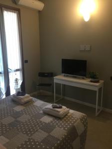 TV a/nebo společenská místnost v ubytování B&B Aurora