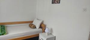 Voodi või voodid majutusasutuse Apartman Paje toas