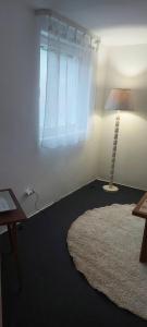 Voodi või voodid majutusasutuse Apartman Paje toas