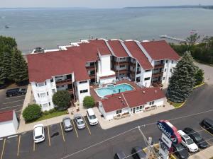 an aerial view of a building with a swimming pool at Beach Room 214 in Traverse City