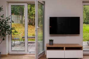 Et tv og/eller underholdning på Stylowe apartamenty
