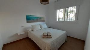 Posteľ alebo postele v izbe v ubytovaní Apartamento Alegría + 13 fotografií