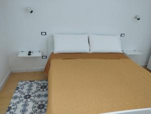 Posteľ alebo postele v izbe v ubytovaní La Bomboniera B&B Amalfi coast + 15 fotografií