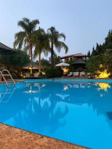 Bazén v ubytování Nora Club Hotel & Spa nebo v jeho okolí