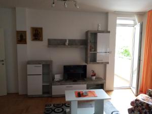 Kuchyň nebo kuchyňský kout v ubytování Apartman MACA