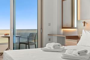Ένα ή περισσότερα κρεβάτια σε δωμάτιο στο Mathios Apartments Falasarna