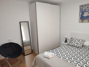 Posteľ alebo postele v izbe v ubytovaní Apartament Roses Platja-Ciutadella
