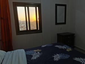 Ein Bett oder Betten in einem Zimmer der Unterkunft Petra Gate Hotel