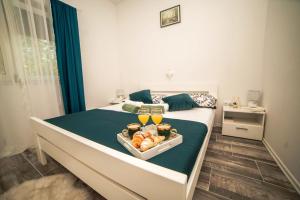 Ένα ή περισσότερα κρεβάτια σε δωμάτιο στο Riverside Plaza +60 φωτογραφίες