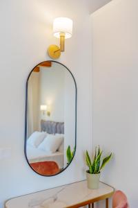 A bed or beds in a room at Casa Del Balsamo