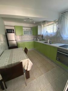 Kuchyň nebo kuchyňský kout v ubytování Andolly Apartments