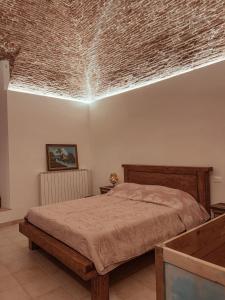 Ένα ή περισσότερα κρεβάτια σε δωμάτιο στο VadoLibera House