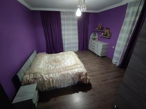 Postel nebo postele na pokoji v ubytování Guest House MARTA