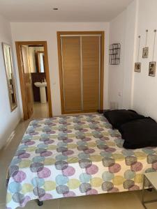Cama o camas de una habitación en Apartamento Aguadulce sur (Almeria)