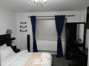 Postel nebo postele na pokoji v ubytování Cozzy Accommodation