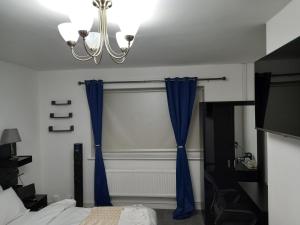 Postel nebo postele na pokoji v ubytování Cozzy Accommodation