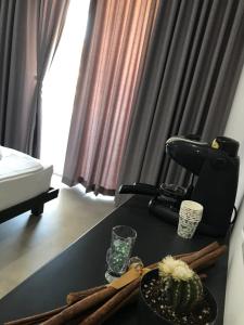 Postel nebo postele na pokoji v ubytování Art De Jon Rooms + 4 fotografie