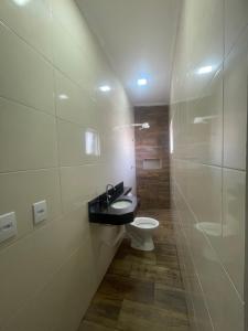 Kylpyhuone majoituspaikassa Hotel Aricanduva