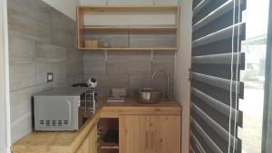 A kitchen or kitchenette at Kineterra spa