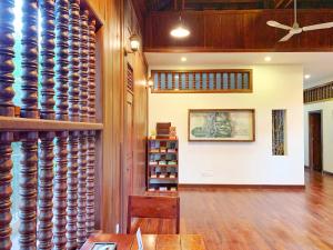 a wine tasting room with wooden barrels on the wall at My Key Polanka Pirvate Villa with Pool in Siem Reap