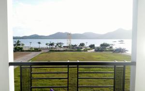 a view of the water from a balcony at Coron Gateway Hotel & Suites in Coron