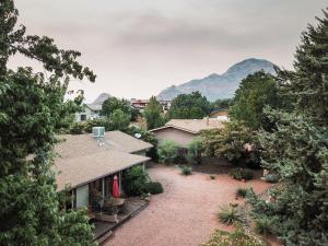 an aerial view of a house with mountains in the background at Zen Desert, 2BR/2BA Apartment, Private Entrance in Sedona