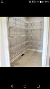 a room with white walls and a room with a shelf at Why Pay Outer Banks (OBX) Beach Prices? Sleeps 9+ in Columbia +35 photos