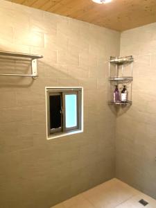 Ванна кімната в 寵物友善九份沐石原宿一館mu shi b&b