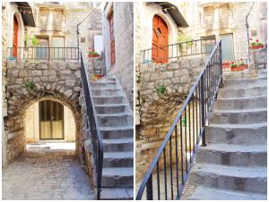 a set of stairs in front of a building at Apartment in the centre of Trogir in Trogir