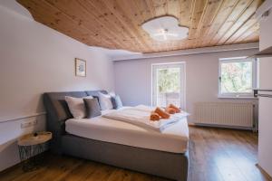 Ein Bett oder Betten in einem Zimmer der Unterkunft Kaiser Apartments