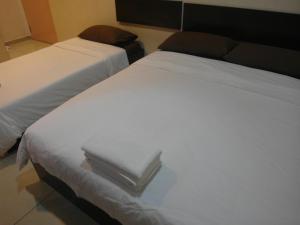 Кровать или кровати в номере Old Penang Hotel - Ampang Point