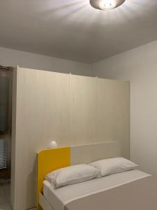 Posteľ alebo postele v izbe v ubytovaní InterMezzo 2 - located in the center of Salento equidistant from the 2 seas