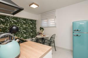 Kuchyň nebo kuchyňský kout v ubytování Apartments Tija Exclusive