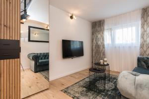TV a/nebo společenská místnost v ubytování Apartments Tija Exclusive