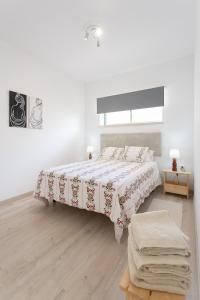 Ένα ή περισσότερα κρεβάτια σε δωμάτιο στο Quinta dos Passarinhos
