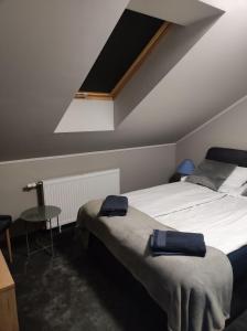 Łóżko lub łóżka w pokoju w obiekcie Pensjonat Klimat Bircza