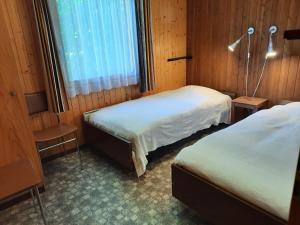 Postel nebo postele na pokoji v ubytování Haus Nussbaumweg 6