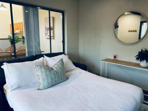 Voodi või voodid majutusasutuse Family Favourite, Spacious 2 Bedroom Unit toas