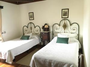 Postel nebo postele na pokoji v ubytování Casa Rural La Gañanía