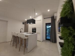 Kuchyň nebo kuchyňský kout v ubytování Casa Colone