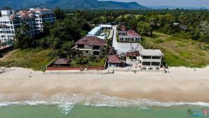 an aerial view of a house on the beach at CC Beach Resort in Khanom