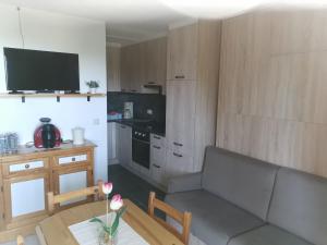 Kuchyň nebo kuchyňský kout v ubytování Appartement Edelweiss Chamrousse vue sur Recoin La Croix de Chamrousse Grenoble